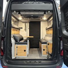 the interior of a van with its doors open