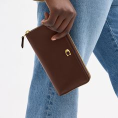 Crafted of refined leather detailed with our Signature hardware this expandable design unzips to reveal a spacious interior. It holds an iPhone X and features 12 card slots two full-length bill compartments and a coin purse to keep essentials organized. | Coach Accordion Zip Wallet - Women's - Brass/maple Holiday Wishlist, Coach Wallet, Signature Hardware, I Phone, Zip Wallet, Iphone X, Belt Bag, Wallets For Women, Card Slots