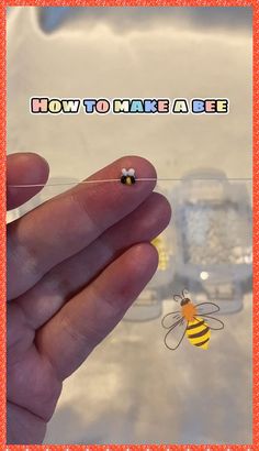 a hand holding a tiny bee with the words how to make a bee on it