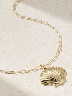 Art often serves as inspiration for Mateo's collections - this necklace pays homage to Italian painter Sandro Botticelli's 'The Birth of Venus'. Handcrafted from 14-karat gold, it's strung with a carefully etched shell modeled after the one the Goddess of love stands on. The 21-inch paperclip chain is perfect for layering with shorter styles. Exquisite Polished Pendant Necklace, Exquisite Pendant Necklace With Polished Finish, Elegant Engraved Jewelry In Recycled Gold, Elegant Engraved Recycled Gold Jewelry, Elegant Gold-plated Chain Necklace With Large Pendant, Elegant Necklace In Polished Recycled Gold, Elegant Gold-tone Jewelry With Large Pendant, Elegant Recycled Gold Pendant Chain Necklace, Elegant Pendant Chain Necklace In Recycled Gold