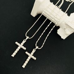 "The Silver Crucifix Cross Necklace - a powerful and timeless symbol of faith and devotion, meticulously crafted to embody reverence and elegance. This necklace combines the significance of the cross with the artistry of design, making it a cherished accessory that speaks to both spirituality and style. Suspended on a refined silver chain, the necklace balances the weight of its spiritual significance and the delicacy of its design. The chain ensures comfortable wear, allowing the pendant to rest close to your heart - a constant reminder of your faith and connection to the divine. Item Details: Silver Cross  Necklace Chain Length Availability: 16\" & 18\" Charm Size: 32 x 15.5 mm  Material: 925  Sterling Silver BENEFITS -Hypoallergenic -Water Resistant -Tarnish Resistant -Perfect for all t Cheap Silver Crucifix Necklace, Silver Cross Jewelry With Beaded Chain, Silver Cross-shaped Jewelry With Beaded Chain, Cross Shaped Beaded Chain Necklace Gift, Cross-shaped Beaded Chain Necklace For Gift, Cross Shaped Beaded Chain Necklace As Gift, Cross Shaped Beaded Chain Necklace For Gift, Beaded Cross Pendant Necklace As A Gift, Silver Cross Necklace With Beaded Chain