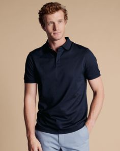 100% cotton, Moisture-wicking Tywhitt Cool finish and quick drying, Knitted jacquard Collar, Concealed one-button placket, Naturally breathable, Machine washable - Performance Texture Polo - Dark Navy | Men's Charles Tyrwhitt Performance Texture Polo Shirt - Dark Navy Blue Size Large Cotton Navy Fitted Cotton Polo Shirt, Cotton Polo Shirt With Placket For Business, Fitted Cotton Polo Shirt For Business, Fitted Cotton Polo Shirt With Spread Collar, Navy Cotton Golf Tops, Navy Cotton Sports Top, Cotton Polo Shirt With Button Closure For Business Casual, Cotton Polo Shirt With Spread Collar For Work, Fitted Cotton Polo Shirt With Button Closure