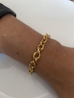 Welcome to my shop. This bracelet is made of tarnish free stainless steel.  Suitable from ages 10 to 100 years old. Clasp: Lobster Material: Stainless Steel. The Model in the photo is wearing a chain length of 8 inches. This is a Custom order. If you have concerns about your skin colour and the gold colour, please agree with yourself first before buying. We don't know you nor are we magicians to know what shade of gold you like. Please message me for any enquiries.  Thank you Stainless Steel Chunky Chain Bracelet, Unisex Big Chain Bracelet, Women Silver Stack Bracelet, Men Chain Bracelet, Birthday Gift For Her. Metal Rolo Chain Bracelet As Gift, Gift Chunky Chain Stainless Steel Bracelet, Gift Stainless Steel Chunky Chain Bracelet, Oval Link Stainless Steel Chain Bracelet Gift, Stainless Steel Oval Link Chain Bracelet For Gift, Metal Bracelets With Rolo Chain As Gift, Metal Bracelets With Rolo Chain For Gift, Chunky Chain Round Bracelet As Gift, Stainless Steel Oval Link Chain Bracelet Gift