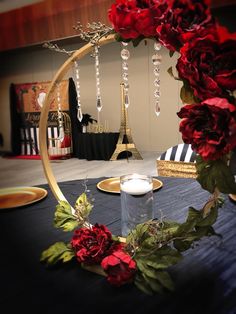 a table with candles and flowers on it