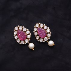 About Product :- Product Code :- SC-SPE-1229 Product Location:- Jaipur, India Earring Style: - Stud Earrings Gross Weight :- 21.500 Grams Gemstone Used :- Moissanite (synthetic), Ruby (Imitation), Pearl, Zircon Gemstone Color :-  White, Red, White Dimensions :-  1.50 Inch Plating :- Gold Plating Over Silver Closure :- Push Back Please let us know if you required in other gemstones which is also possible.  Shipping :- We offer Free shipping. We assure for 15-20 days delivery in most of the parts of the globe but some places can even go up-to 25 days. we provide our customers the luxury of having their own, exclusive designs made only for them. We understand and respect privacy and do not display custom designs on our website or catalog. To discuss your personal and unique designs please con Temple Jewelry Gemstone Earrings For Party, Hand Set Pink Earrings For Anniversary, Pink Hand Set Earrings For Anniversary, Anniversary Hand Set Pink Earrings, Pink Dangle Temple Jewelry Earrings, Elegant Pink Pendant Earrings, Pink Anniversary Earrings, Pink Round Temple Jewelry Earrings, Pink Temple Jewelry Round Earrings