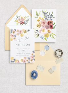 the wedding stationery is laid out and ready to be used as an envelope for guests