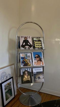 a magazine rack with many magazines on it