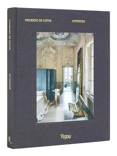 a book with an image of a room in the middle and a door leading to another room