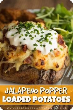 an image of jalapeno popper loaded potatoes with cheese and sour cream