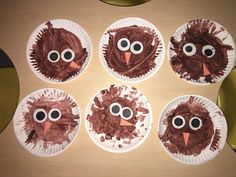 four paper plates with turkey faces on them