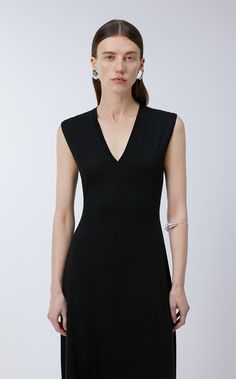 100% wool Black V-neck Sleeveless Dress For Work, Classic V-neck Sleeveless Dress For Work, Classic Sleeveless Midi Dress For Night Out, Sleeveless Viscose Maxi Dress For Work, Black Sleeveless Viscose Mini Dress, Sleek Sleeveless Viscose Dress, Classic Fitted V-neck Sleeveless Dress, Classic V-neck Midi Dress For Night Out, Black Sleeveless Viscose Midi Dress