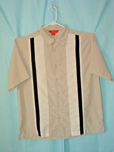 Charlie Harper style men's casual shirt from SOLERO in size XL. 100% polyester, short sleeve, button front. Sewn contrasting panels on the front. Great condition. Spare button still sewn to the materials tag. Measures 24" pit to pit and 30" collar to hem. Free next day shipping! Casual Collared T-shirt With Patchwork, Casual Collared Patchwork T-shirt, Fitted Short Sleeve T-shirt With Buttons, Fitted Patchwork Collared Top, Fitted Collared Patchwork Top, Fitted Patchwork Short Sleeve Tops, Fitted Patchwork Tops With Short Sleeves, Retro White Patchwork Shirt, Fitted White Patchwork Shirt