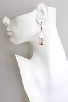 18k gold plated brass earrings with mother-of-pearl, glass, and freshwater pearls. Each earring weighs .12oz and measures 2.5in from top of hook. Mother Of Pearl Earrings, Multi Strand Necklace, Gift Card Sale, Brass Earrings, Multi Strand, Mother Of Pearl, Freshwater Pearls, 18k Gold, Pearl Earrings