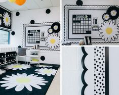 a room with black and white decor and flowers on the wall