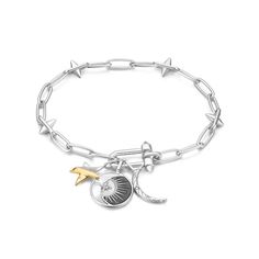 Combine your love of gold and silver with this statement charm bracelet, A silver spike link bracelet is teamed with a shiny two tone star on one side, a beautifully detailed celestial-inspired moon design features a crescent of mother of pearl, a touch of midnight black enamel and a single sparkling cubic zirconia stone and a chic cosmic moon on the other. Slip these charms on/off a necklace or bracelet for a unique, celestial jewelery piece. Rhodium Plated Sterling Silver Mother of Pearl and Cubic Zirconia Accents Bracelet measures 7.25" The Missing Link, Missing Link, Bar Bracelets, Moon Design, Statement Bracelet, The Missing, March Birth Stone, Silver Studs, Cross Pendant