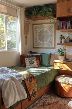 a small bedroom with a bed, desk and bookshelf in the corner next to a window