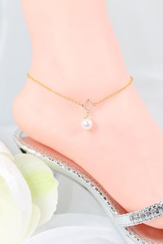 P3 Absolutely Stunning Ankle bracelet Pearls symbolizes new beginnings, purity, so it would make a perfect gift for bride to be.  AAA grade, very high luster Freshwater teardrop pearl was used in this lovely jewelry and it is hand set in our studio in Texas.  This lovely anklet is exclusive and one of a kind. It is very hard to find Ankle jewelry during Fall and Winter seasons, for which reason we have decided to carry them all year round.  These stunning and delicate beads are set in 14KY gold fill chain with an 18KY gold fill clasp. The anklet measure approximately 9.5 inches with a 1/2 inch extender,  please let us know if you need it little bit longer, it can be adjusted for you. If this purchase is a gift and is going directly to the recipient, we can gift box it and send a special ha Gold Anklets With Pearl Charm For Gift, Gold Anklets With Pearl Charm As Gift, Gold Delicate Anklet For Gift, Elegant Adjustable Chain Anklet As Gift, Delicate Gold Anklet For Gift, Delicate Gold Anklets As Gift, Delicate White Anklet As A Gift, Gold Dainty Anklets With Pearl Charm, Dainty Gold Anklets With Pearl Charm