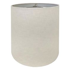 a white lamp shade is shown on a white background and it has a silver base