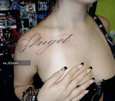 a woman with her hands on her chest and the word angel written in cursive writing