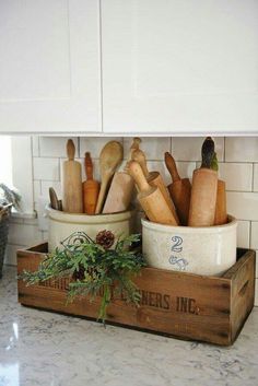 the kitchen counter is clean and ready to be used as a utensil holder