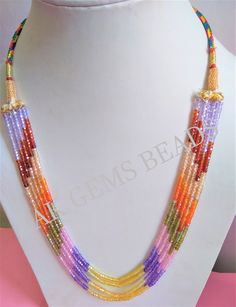 PRODUCT DETAILS: Natural AAA Multi Cubic Zirconia 5 Strand Semi Precious Gemstone Beaded Necklace Jewelry For Girls and Woman Stone Name :- Cubic Zirconia ( Blue, Yellow, Purple, Pink, Green, Orange, Red, Champagne Brown ) Bead Size :- 3mm Length :- 13 to 15 Inches Bead Shape :- Rondelle Bead Type :- Faceted Quality :- AAA (Excellent) Treatment :- Natural 2. NECKLACE LENGTHS :- 1st Strands :- 13 Inches 2nd Strands :- 13.5 Inches 3rd Strands :- 14 Inches 4th Strands :- 14.5 inches 5th Strands :- Gemstone Beads Wholesale, Gemstone Beads Jewelry, Semi Precious Jewelry, Gemstone Beaded Necklace, Cz Necklace, Amethyst Beads, Beads And Wire, Wholesale Beads, Precious Jewelry