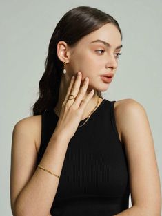 Enhance your bracelet collection with this striking 18K gold-plated layered chain bracelet, featuring rows of meticulously textured beads that offer a luxurious feel. A versatile addition for an effortlessly chic stacked look. Delicate Bracelets For Layering, Delicate Layering Bracelets, Delicate Chain Bracelet For Layering, Gold Multi-strand Beaded Bracelets For Layering, Gold Beaded Chain Trendy Bracelets, Gold Pearl Bracelet With Delicate Chain, Gold Pearl Bracelet For Everyday Chic, Elegant Double Strand Gold Bracelet, Elegant Double Strand Gold Beaded Bracelet