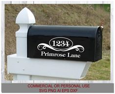 a black mailbox with the words primeose lane on it and an image of a white picket fence