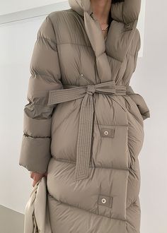 Stay warm and elegant this winter wearing our luxurious Queenie Coat. Crafted from superior goose down, this hooded, belted coat offers superior insulation and protection from the cold. Our exclusive design ensures that this coat is both stylish and comfortable; perfect for winter evenings. Details & care Fixed hood Front-button closure Lined, with 800-fill-power down 90% goose down, 10% feather Nylon Dry clean Women's coat Item #312901 Size info XS=US2=UK6=EU32 S=US4-6=UK8-10=EU34-36 M=US8-10=U Luxury Winter Parka With Double-lined Hood, Luxury Long Puffer Jacket With Detachable Hood, Luxury Nylon Hooded Jacket With Detachable Hood, Luxury Functional Down Hooded Jacket, Luxury Down Hooded Jacket With Adjustable Hood, Luxury Double-lined Hood Puffer Jacket For Cold Weather, Luxury Long Sleeve Puffer Jacket With Adjustable Hood, Luxury Weatherproof Nylon Hooded Jacket, Luxury Windproof Outerwear For Cold Weather