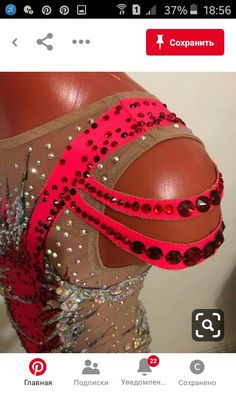 the back of a woman's bra with sequins and beads on it