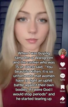 a woman with blonde hair is looking at the camera and has an interesting message on her face