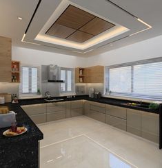 a large kitchen with black counter tops and white walls