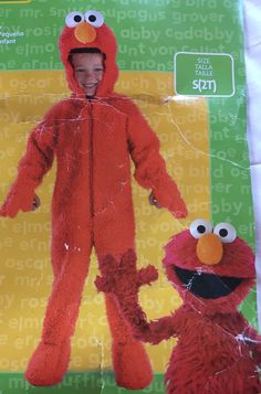 the sesame street character is wearing an elmo costume