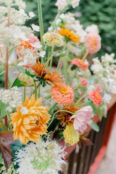 a bunch of flowers that are in a vase