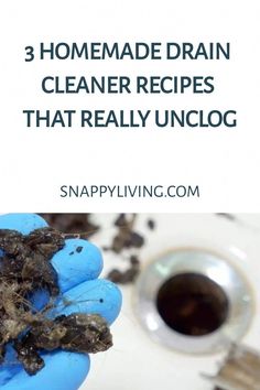 a person holding dirt in their hand with the words 3 homemade drain cleaner recipes that really unclog