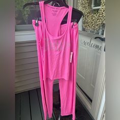 This Is A New 2 Piece Pajama Set From Juicy Couture. This Set Has A Sleeveless Racerback Top And Drawstring Long Pants. Great To Keep Or Give As A Gift Size Medium Pink Stretch Loungewear Sets, Pink Fitted Loungewear Set, Sleeveless Athleisure Loungewear Sets, Sleeveless Athleisure Sets For Loungewear, Pink Workout Set For Spring, Pink Spring Workout Sets, Pink Workout Sets For Spring, Pink Athleisure Loungewear Set, Ribbed Loungewear