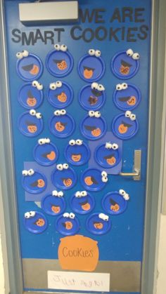 a blue door that has some cookies on it and the words we are smart cookies