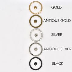 an assortment of different types of rings on a white background with the words gold, antique gold, silver, antique silver and black