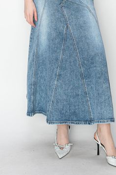 Details Style No. AT2043CSM A denim maxi skirt with stretch combines the timeless appeal of denim with the comfort of stretch fabric. This skirt typically features a flattering silhouette that hugs the hips and flares out gracefully towards the hemline, elongating the body and providing ease of movement. Whether paired with a simple tee for a laid-back look or dressed up with a blouse for a more polished ensemble, this versatile piece effortlessly merges style and comfort for any occasion. Highlights Stretch Denim Fabric Maxi Skirt Medium stone wash Adjustable waistband detail CF length : 38" Model size : Medium Spring Full-length Denim Skirt With Frayed Hem, Spring Full Length Denim Skirt With Frayed Hem, Chic Fitted Medium Wash Maxi Skirt, Spring Stretch Long Denim Skirt, Spring Long Stretch Denim Skirt, Spring Full Length Skirt With Frayed Hem, Full-length Denim Skirt With Frayed Hem, Full Length Denim Skirt With Frayed Hem, Full-length Denim Blue Maxi Skirt