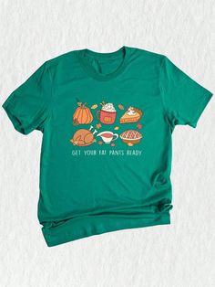 Welcome to our shop, where we celebrate all things autumn and Thanksgiving with our unique and stylish collection of t-shirts.  This Thanksgiving shirt is the perfect addition to your festive wardrobe. Made from comfortable fabric, it will keep you cozy throughout the season.  Our funny Thanksgiving design combines all the elements that make this holiday special. With a delightful turkey and iconic fall symbols like pumpkins, it captures the essence of autumn.  Whether you're attending a Thanksg Funny Cotton Tops For Fall, Green Tops For Fall Holiday, Fall Crew Neck Shirt With Funny Print, Funny Graphic Print Shirt For Fall, Casual T-shirt For Fall Holiday, Casual Fall Holiday T-shirt, Thanksgiving Cotton Top With Graphic Print, Green Graphic Tee For Fall, Funny Print Relaxed Fit Shirt For Fall