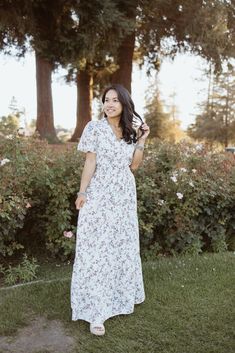 Frolicking in flower fields will be the norm when you wear the Michaela Dress. This dress features a vintage-inspired floral pattern against a neutral shade appropriate for any occasion. Its tiered, full-length skirt and cap sleeves provide coverage, while the flattering, surplice neckline keeps you cool on summer evenings. The best part? It’s also available for kids, allowing you and your daughter to spend the day twinning! STYLE INFO & CARE Smocked Waist Tiered Skirt Fully lined 100% Polyester Full Length Skirts, Surplice Neckline, Dresses Xxl, Dress Boho, Plus Size Maxi Dresses, Ruffled Maxi Dress, Tier Skirt, Tiered Skirt, Dress Party