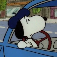 a cartoon dog sitting in the driver's seat of a car with his head out the window