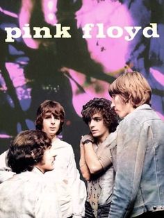 the pink floyd band is standing in front of a poster