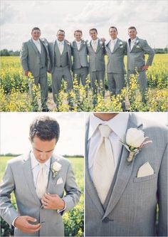 a group of men in suits standing next to each other