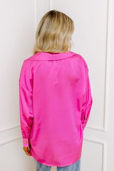 – Simple and stunning for a sweet night out – Lightweight, soft textured material – V-cut, collared neckline – Long, loose sleeves with button closure cuffs – Relaxed, flattering silhouette that ends in a straight upper-thigh hemline Pink Long Sleeve Blouse For Night Out, Spring Party Tops With Collared Neckline, Pink Fall Blouse For Night Out, Pink Long Sleeve Blouse With Button Closure, Feminine Pink Blouse For Night Out, Pink Collared Top With Button Closure, Pink Button-up Blouse For Party, Pink Collared Solid Color Blouse, Pink Collared Blouse With Solid Color