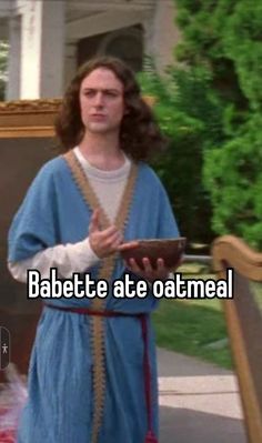 a woman in blue dress standing next to a bench with her hands folded out and the words babette ate oatmeal on it