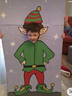 a cardboard cut out of an elf