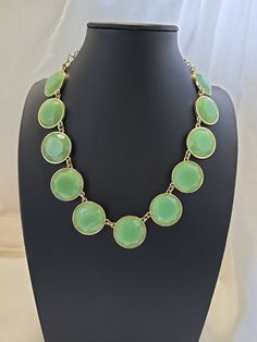 Add a touch of bohemian elegance to your outfit with this statement collar necklace. The faceted green acrylic pendant with round shape and cable chain type is the perfect combination for a unique look. The lobster closure and adjustable length make it suitable for any occasion and the bezel setting style adds a touch of sophistication. This vintage-inspired piece with a modern twist is a must-have for any fashion jewelry collection. Uv blacklight Reactive glow Trendy Green Necklace For Party, Green Necklaces With Lobster Clasp For Party, Party Green Necklaces With Lobster Clasp, Green Round Pendant Necklace With Lobster Clasp, Acrylic Pendant, Statement Collar, Statement Collar Necklace, Uv Reactive, Collar Necklace