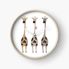 a clock with four giraffes on it