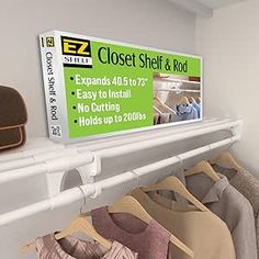 there is a closet with clothes hanging on the wall and a sign that says closet shelf & rod