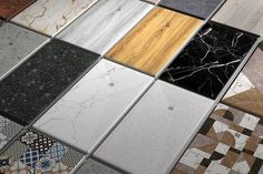 many different types and colors of tile on the floor in various shapes and sizes, including marble